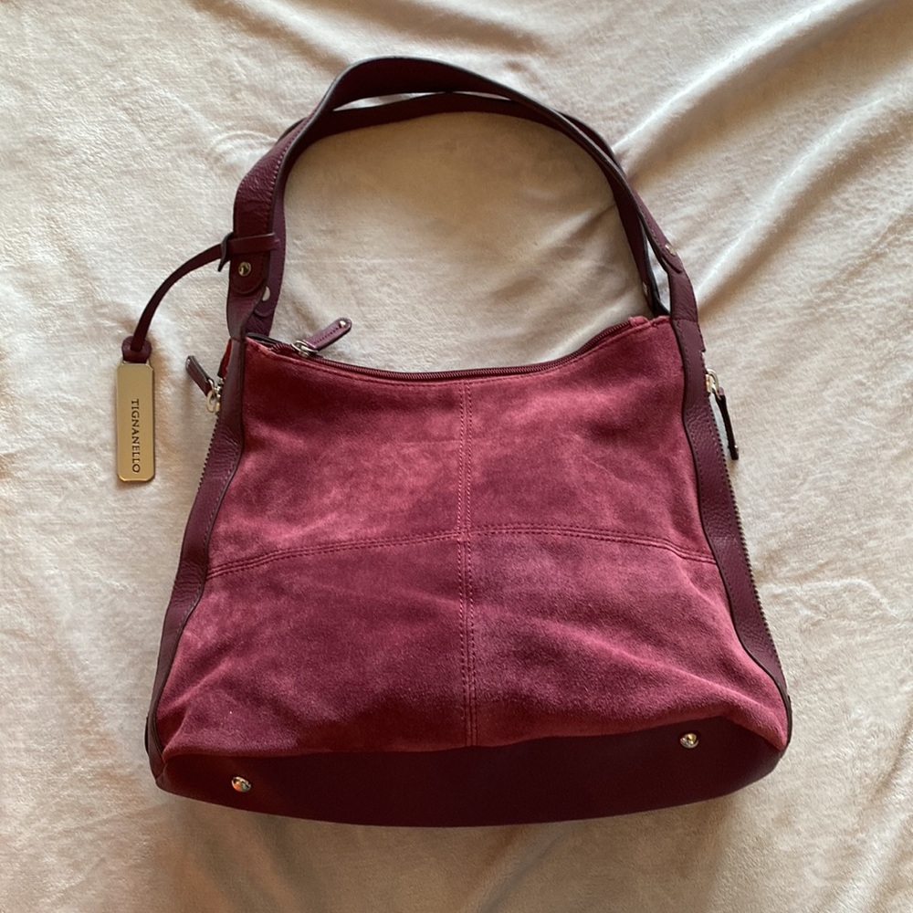 Tignanello burgundy suede and genuine leather purse. Excellent condition.